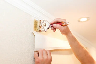 Pose de papier peint à Terres de Druance — revêtements muraux et toiles de verre
